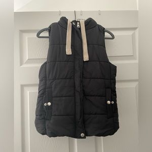 Black puffy vest